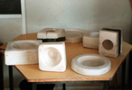 a variety of plaster moulds for making ceramic objects in different shape and sizes