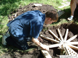 James building the Roman style kiln at the Buddhafield festival