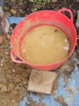 Mixing bucket for adding dry clay to the water