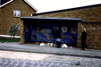 a view of the bus shelter mural made by children from ceramic tiles and paint