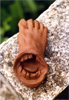 an amusing clay work titled foot and mouth